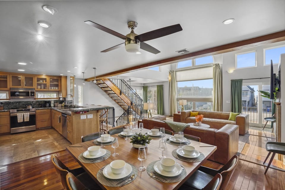 Dining area off the kitchen offers space to gather for meals, games, or happy hour.