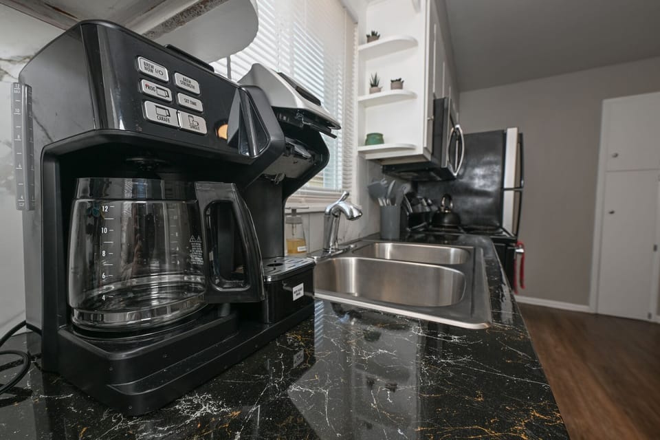 Stocked Kitchen!  Utensils, place settings, pots & pans, crock pot, basic spices