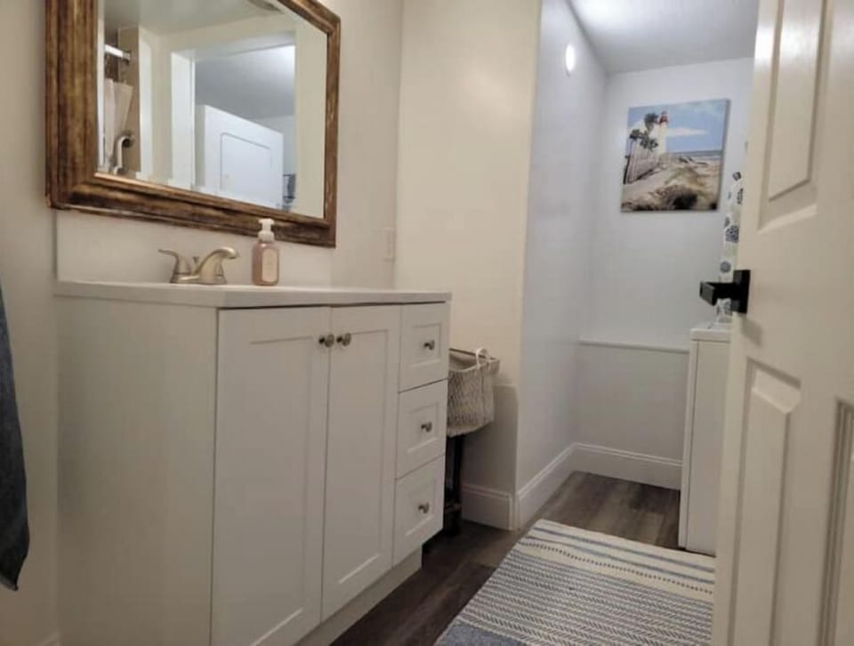 Bathroom with Washer/Dryer, Walk-in Shower, New Toilet and Vanity