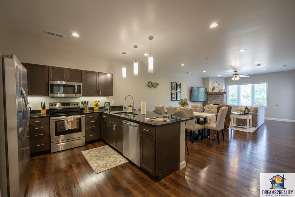 View of Kitchen, Dining, and Living Room