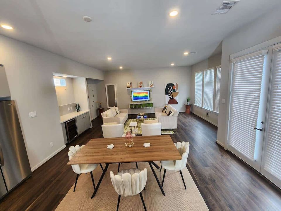 Zen House: You are greeted by an abundance of natural light that floods through large windows, blurring the boundaries between indoor and outdoor living. The open floor plan seamlessly connects the living areas, allowing for a smooth flow.