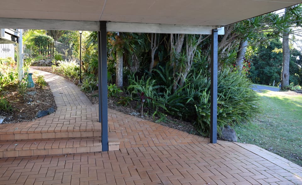 Undercover Parking and Grassed Driveway