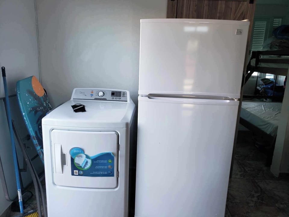 Refrigerator/ washer and dryer located in apartment