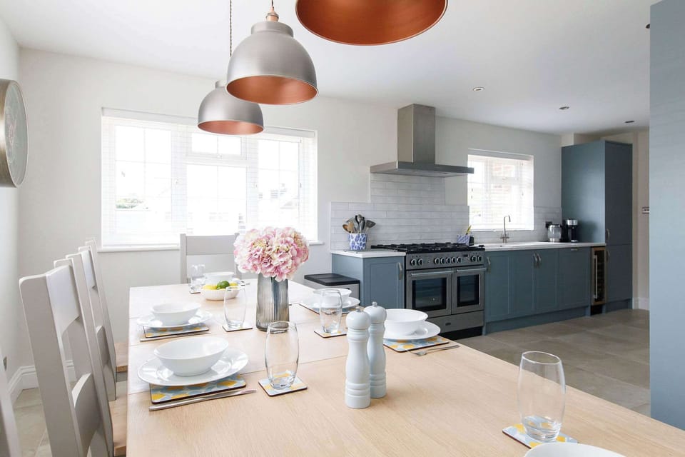 The dining area is connected to the kitchen.