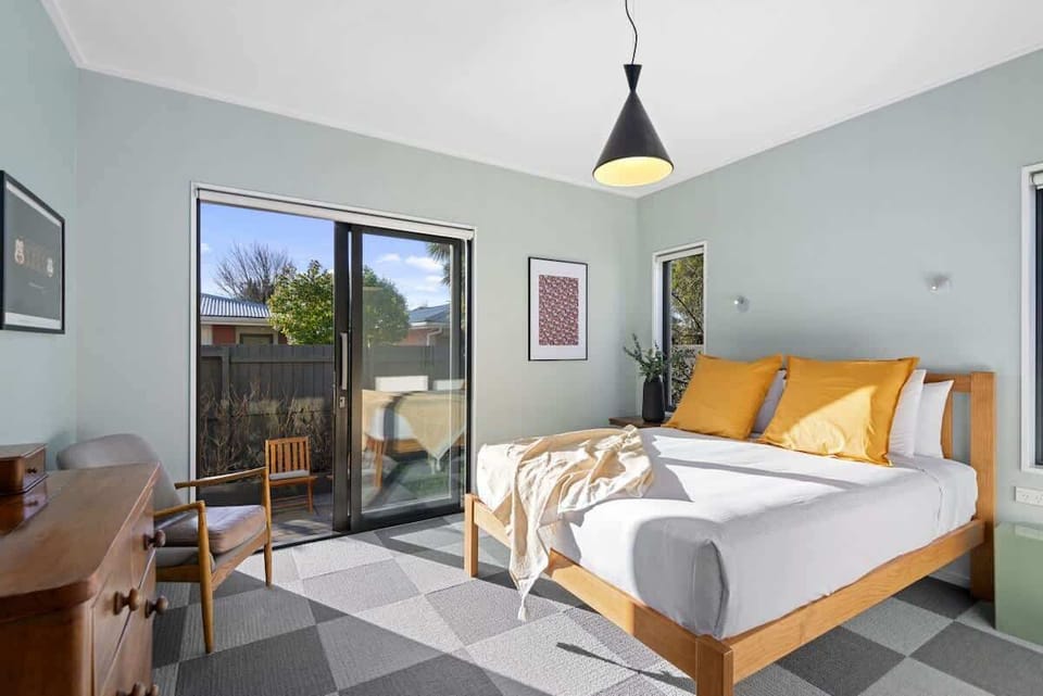 Lovely sunny bedroom that opens out to the side garden,