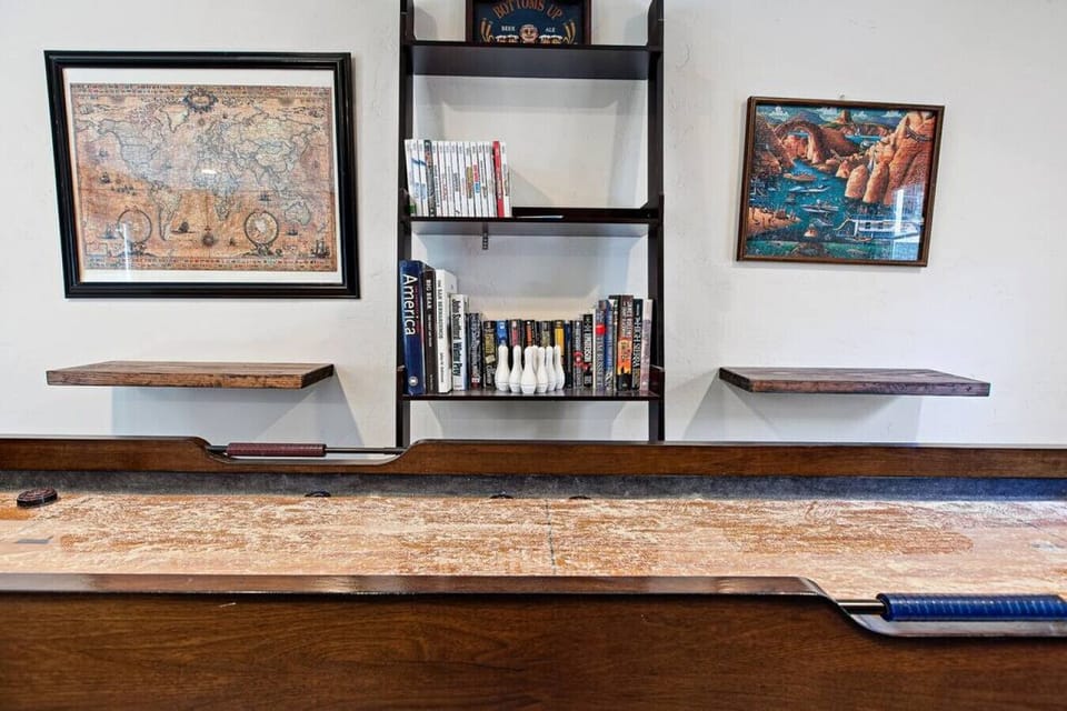 Who is up for some shuffle board? Game room also comes complete with wii console and games.