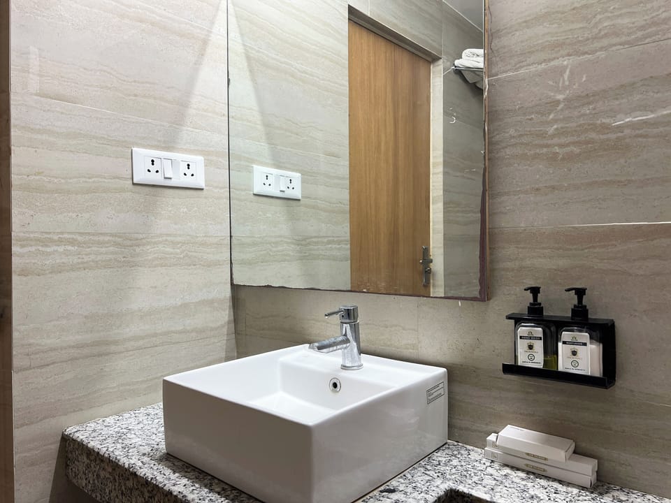 Suite Room | Bathroom | Shower, free toiletries, towels, soap