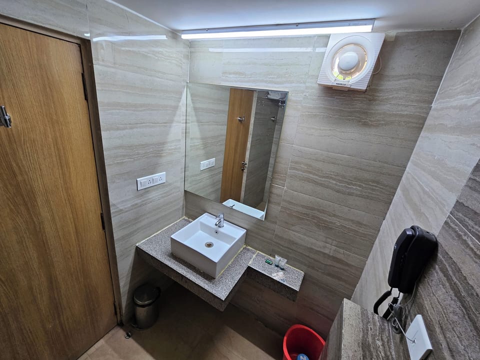 Suite Room | Bathroom | Shower, free toiletries, towels, soap