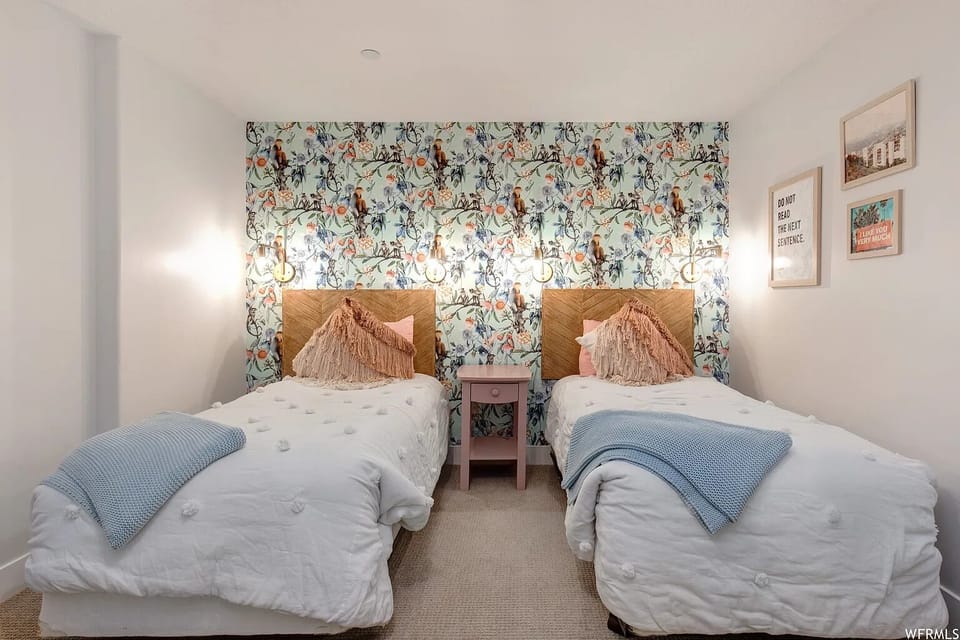 The downstairs flex space (not included in BR count) features two twin beds. 