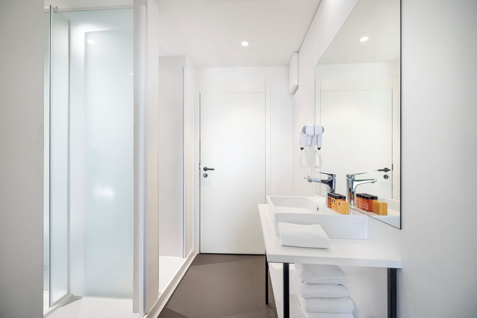 Shower, free toiletries, hair dryer, towels