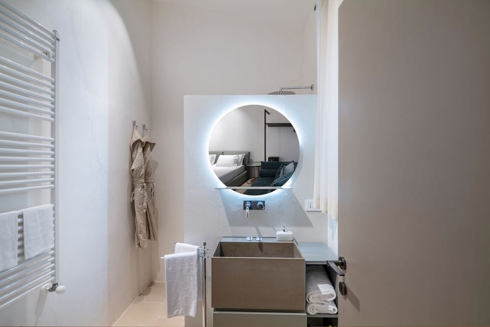 Junior Suite, Kitchenette, Garden View | Bathroom | Shower, rainfall showerhead, free toiletries, hair dryer