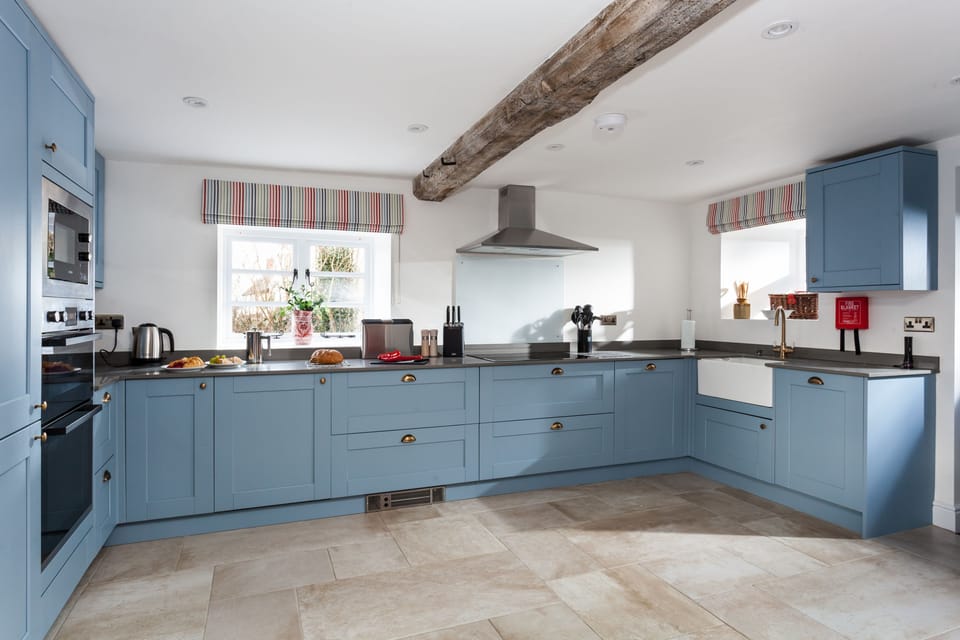 Kitchen with exposed beams