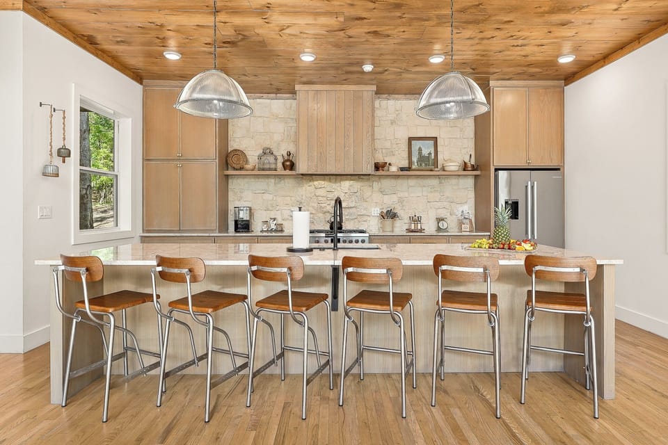 Kitchen: Stylish space with modern appliances and inviting seating for culinary creativity!