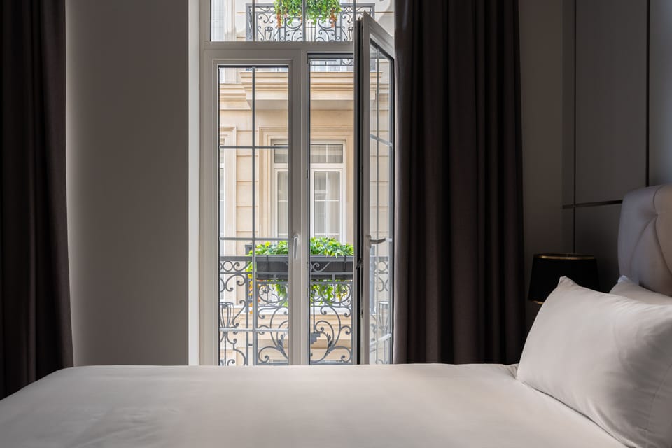 Premium bedding, down comforters, memory foam beds, minibar