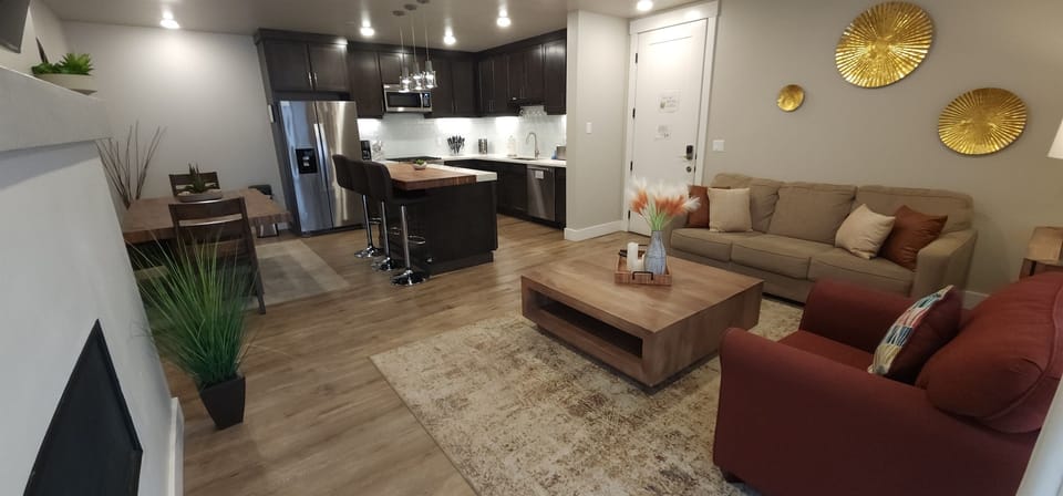 Enjoy meals together at the dining table and kitchen island — seating for the whole crew.