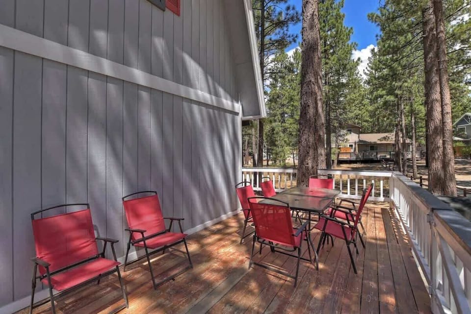 Patio tables outside on back deck. 