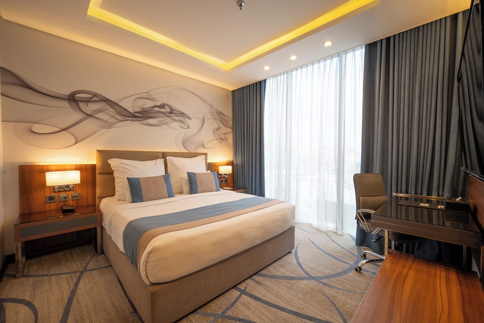 Down comforters, pillowtop beds, desk, blackout drapes
