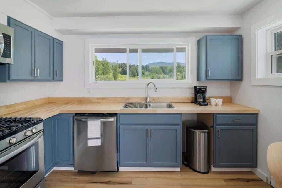 Spacious, updated and fully stocked Kitchen! Can't beat this view of Stowe Pinnacle either!