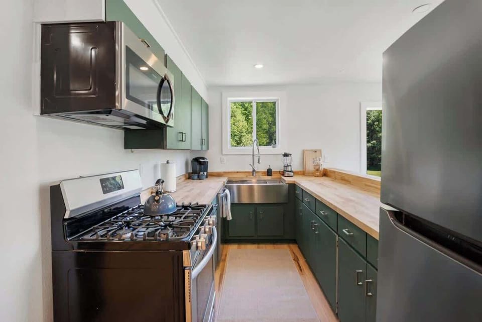 Newly Updated Kitchen comes fully stocked with coffee maker, blender, spices, cookware and more!