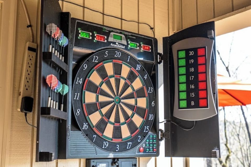 Electronic dart board on downstairs patio. Darts included. 