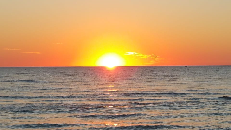 On the beach, white sand, beach towels