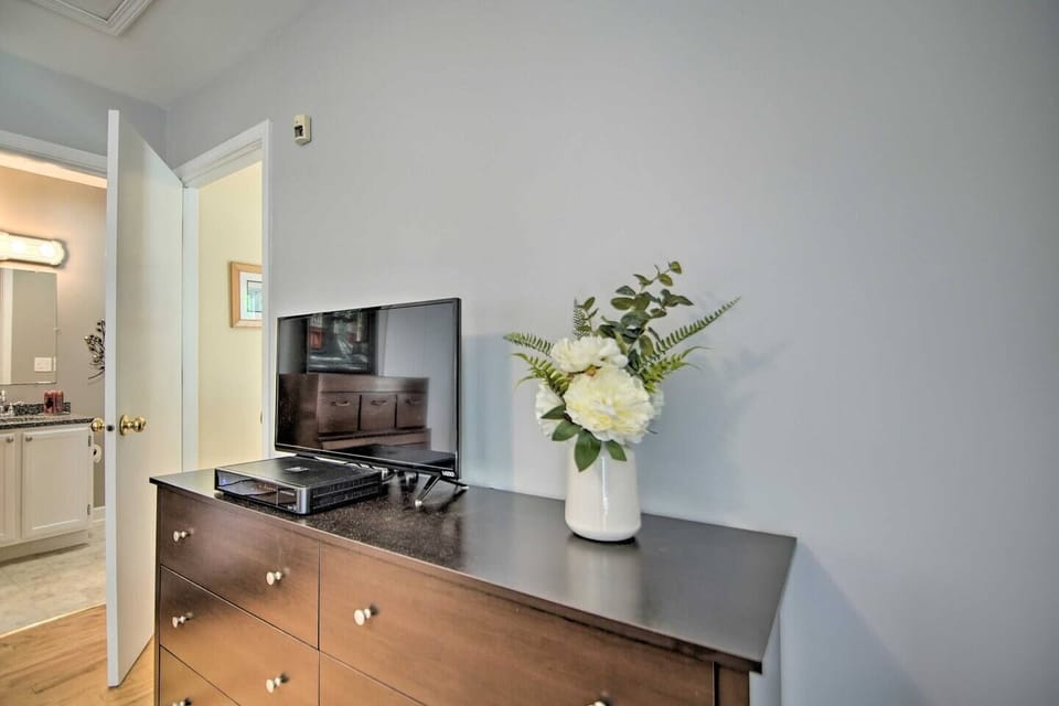 3Bd Unit: Enjoy the ensuite bathroom and smart TV with cable for privacy and end of day relaxation in the master bedroom.