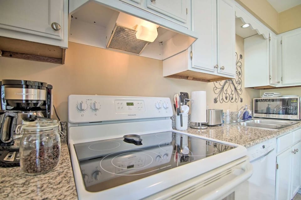 3Bd Unit:  A coffee station with fresh coffee, an electric stove and oven, and a microwave is included for cooking convenience. Dishes, cookware, spices, utensils, glasses, wine glasses and children’s plastic dishware and utensils are also available.