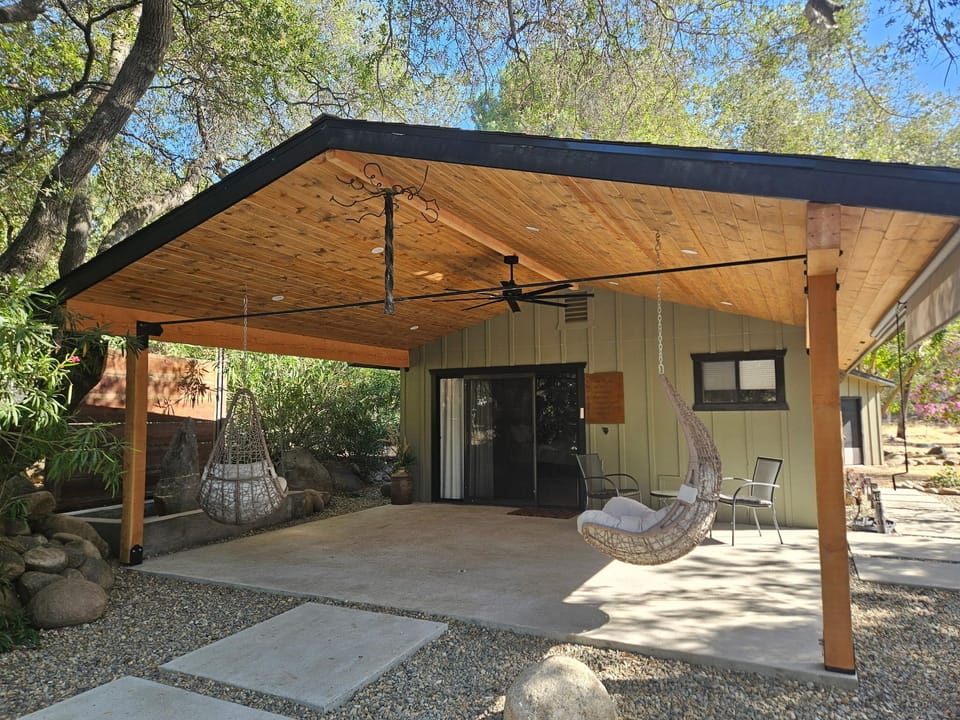 Hang and chill beneath newly expanded patio to charge up or unwind.