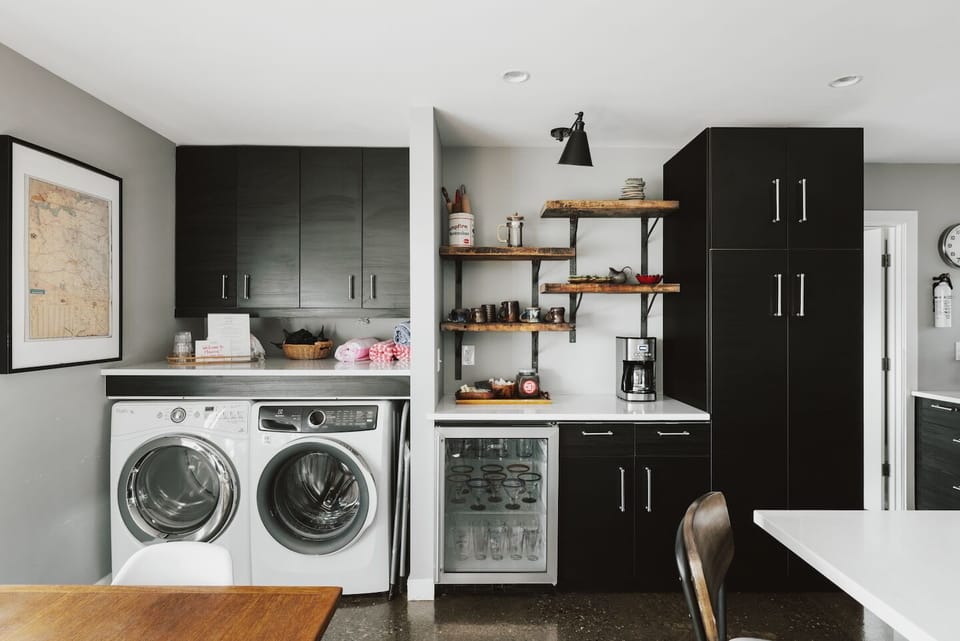 Laundry and Coffee Bar with beverage fridge.