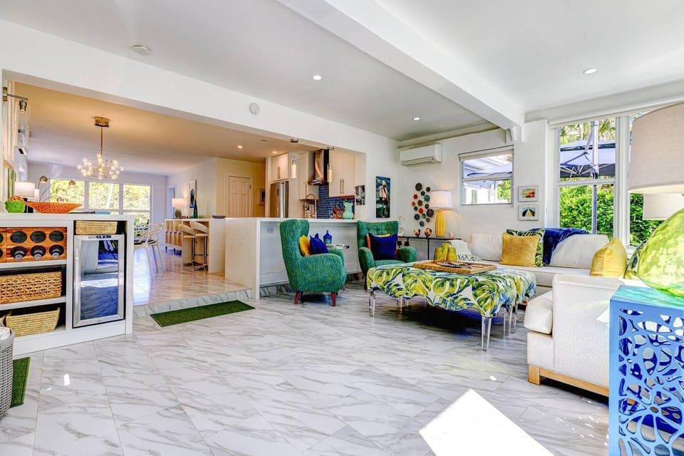 Enjoy the heart of togetherness as the open floor plan seamlessly connects the family room and kitchen, creating a vibrant space.