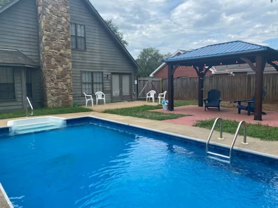 Inviting backyard with gazebo and relaxing pool
