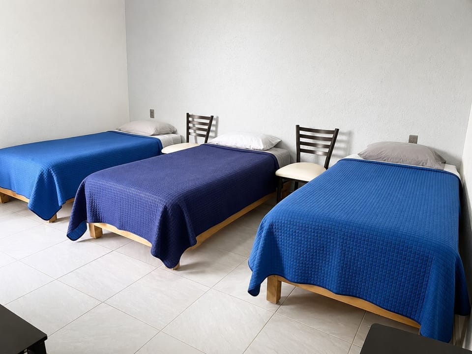 Superior Triple Room | Desk, laptop workspace, WiFi (free), individually furnished