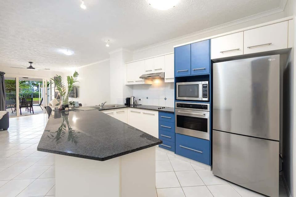 The spacious kitchen makes holiday dining effortless, with generous bench space, modern appliances and everything needed for relaxed breakfasts or easy dinners at home.