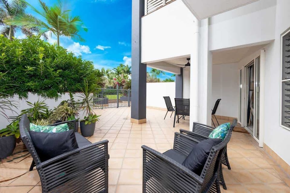 The private patio offers a peaceful outdoor setting for morning coffee, casual drinks or relaxed evenings surrounded by tropical greenery.