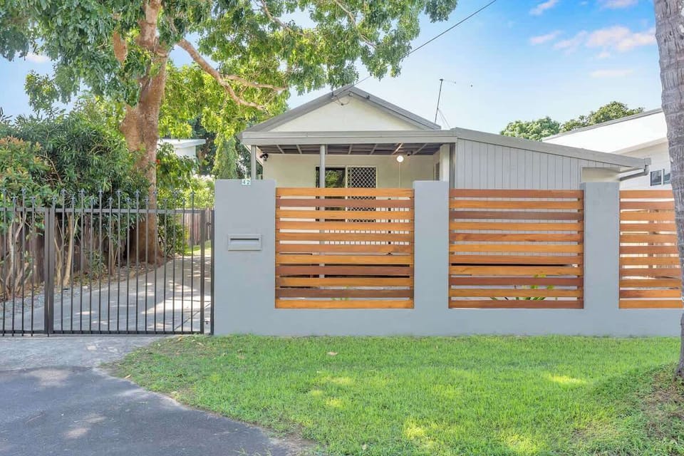 Set behind a fully fenced frontage, this welcoming beachside home offers privacy, secure off-street parking, and room for a boat, caravan, or campervan.