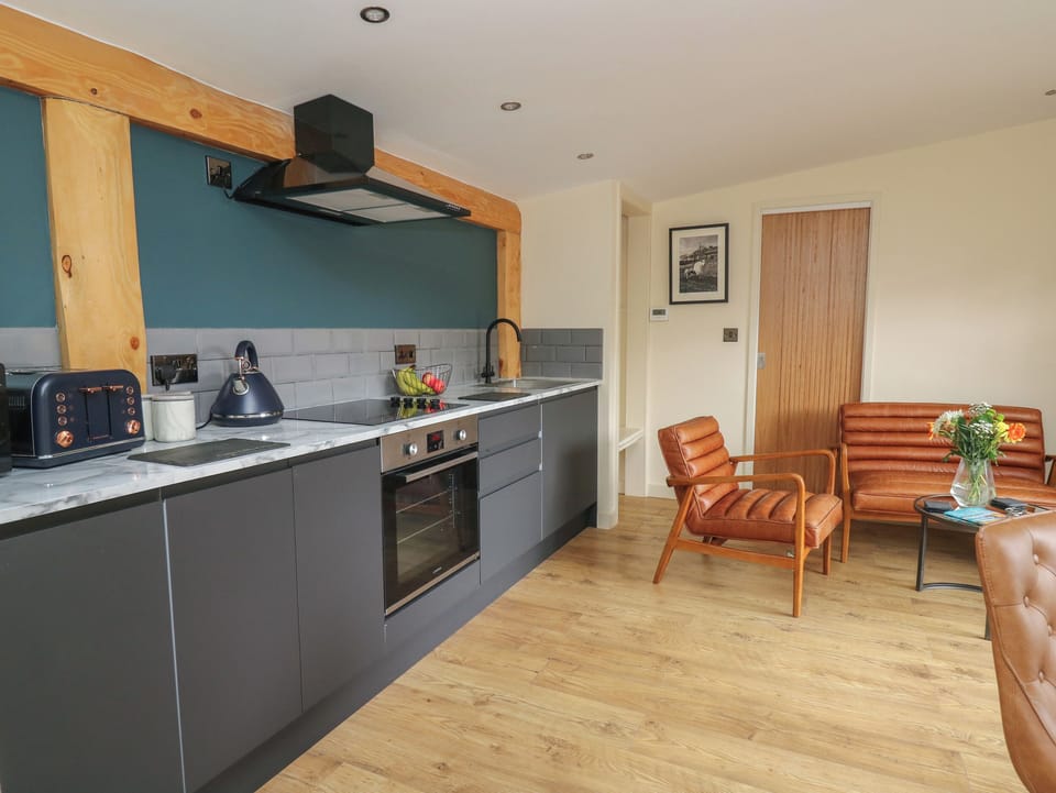 Fridge, electric kettle, toaster, cookware/dishes/utensils