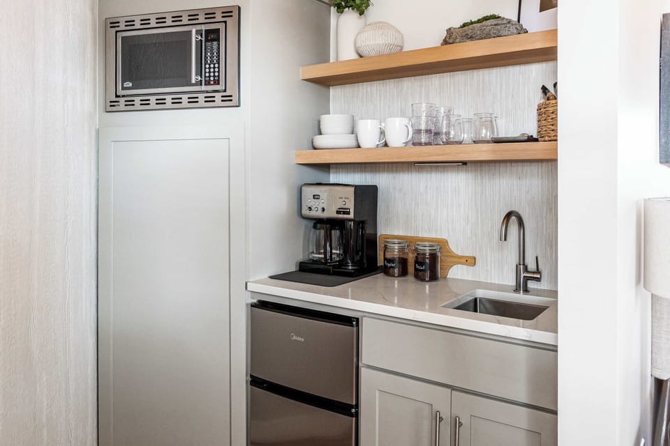 Enjoy morning coffee with a fully stocked kitchenette near wineries.
