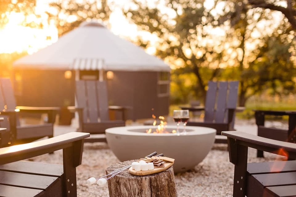 Unwind at sunset around the fire pit beneath Texas skies.