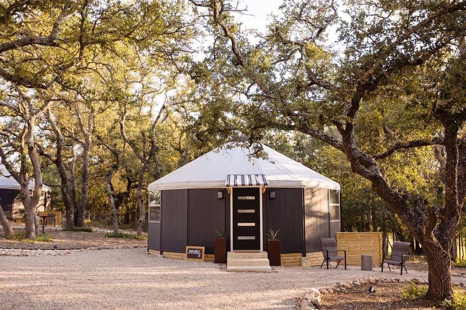 Private modern yurt tucked among Hill Country oaks.