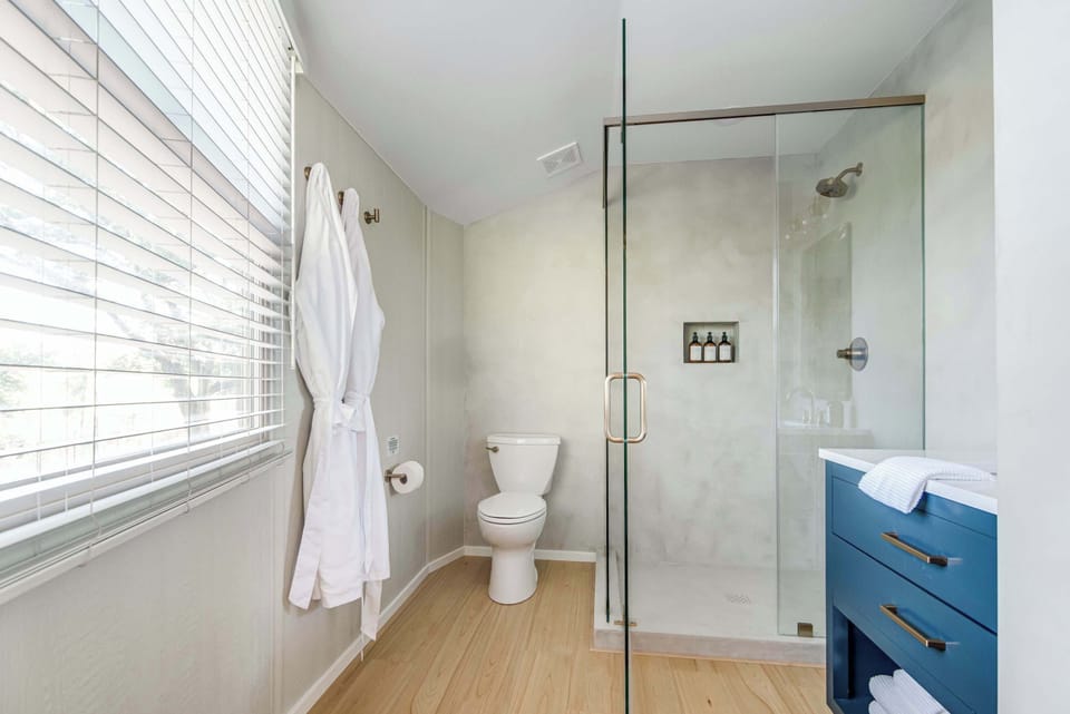 Walk-in shower with provided soaps
