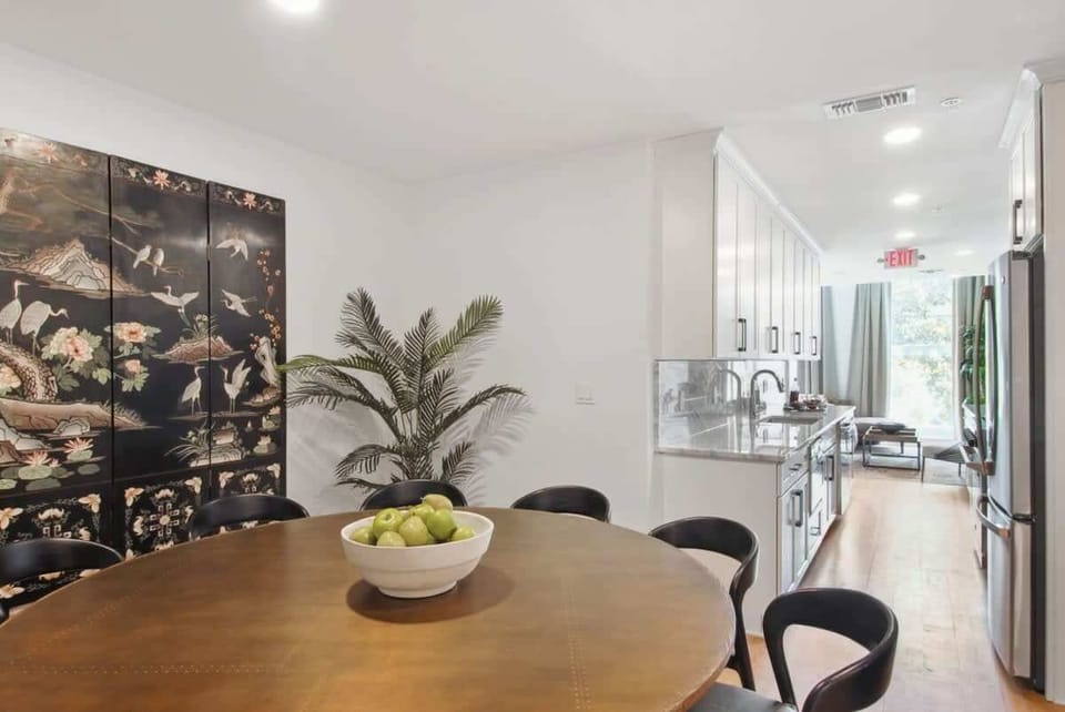Dining Area |Massive 10-person round Dining Table Space for Group Meals and Shared Moments | Third Floor 