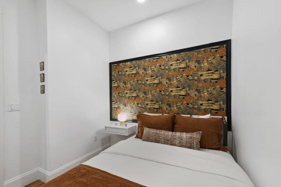 Bedroom 2 | Queen Bed with Easy Access to Shared Bathrooms | First Floor
