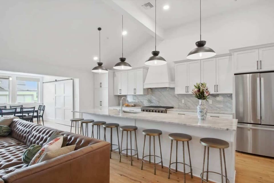 Kitchen Area | Open Concept Layout with Large Seating Island for Eight Guests