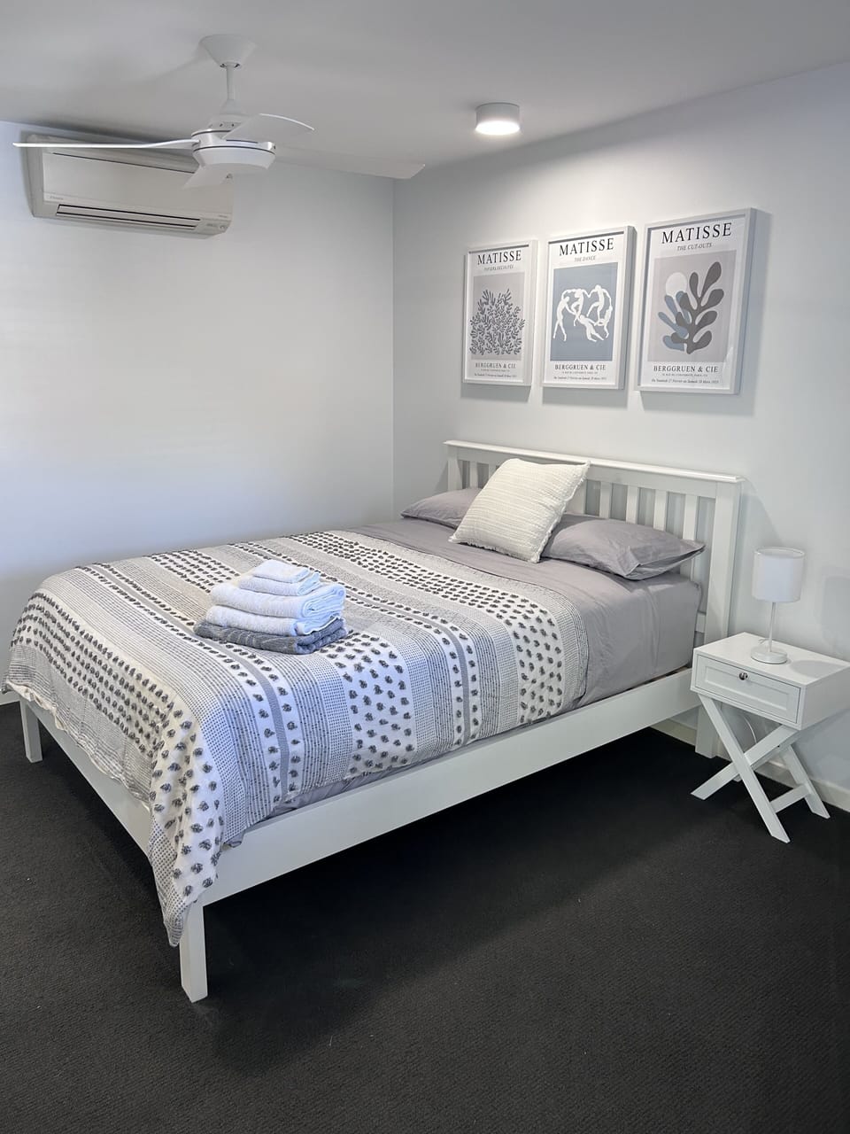 Main bedroom queen bed with quality sheets and towels