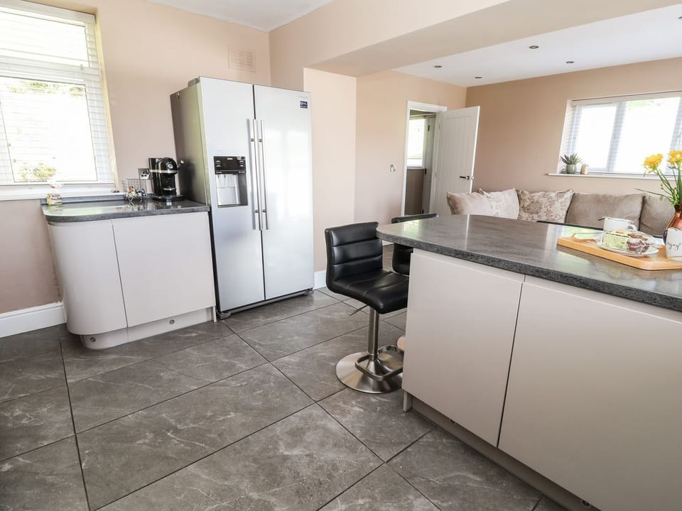 Fridge, electric kettle, cookware/dishes/utensils