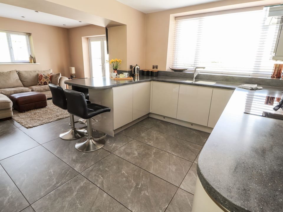 Fridge, electric kettle, cookware/dishes/utensils