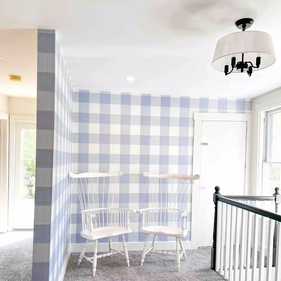 The spacious landing at the top of the stairs is instagram worthy