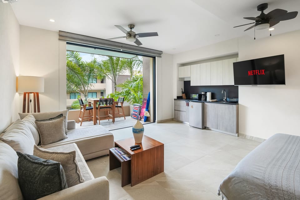 Premium Studio | Living area | 43-inch Smart TV with satellite channels