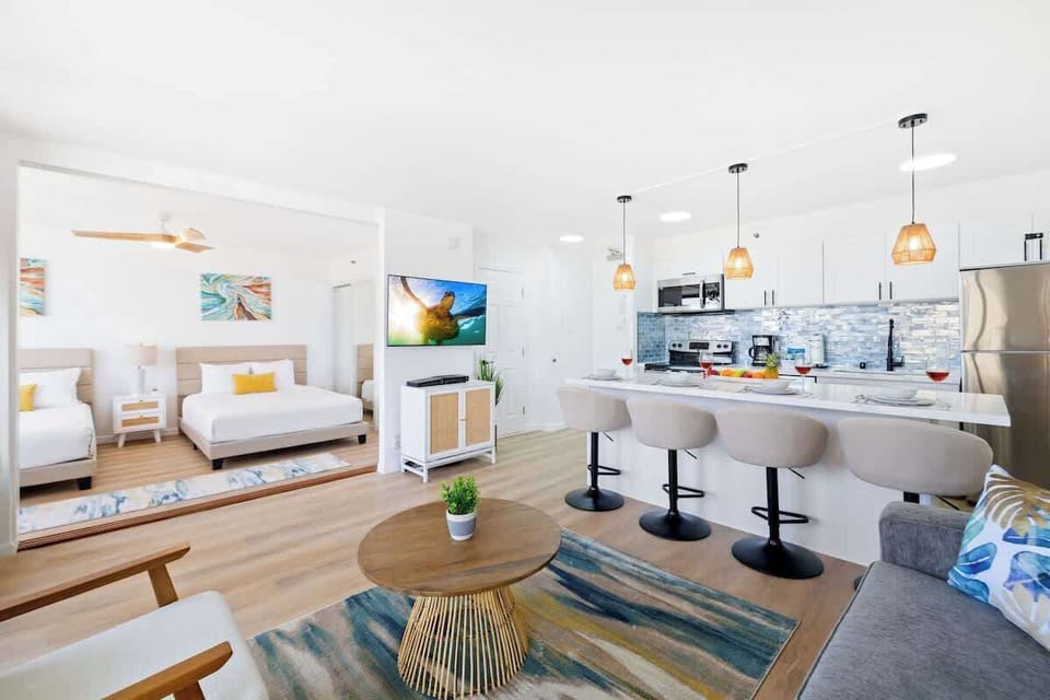 The bedroom is separated from the living room by a sliding door.