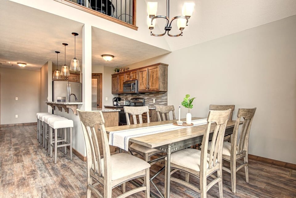 The spacious dining table seats up to 10 people and the island seats 4 people.